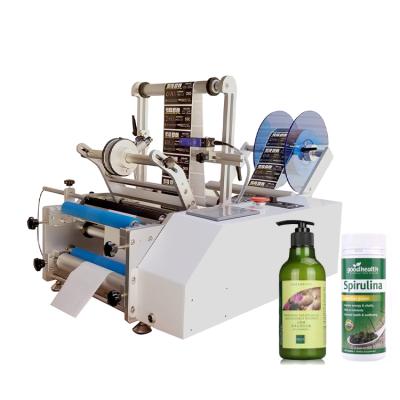 China Simple manual food labeling machine, plastic bottle, small wine bottle packaging machine for sale