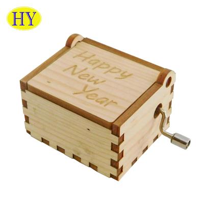 China Custom Gifts Vintage Operated Unfinished Wooden Hand Cranked Music Box Gift for sale