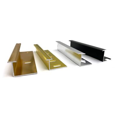 China Modern Metal Floor T Strip Ledge Gold Border Wall Shape Tile Protective Ceramic Trim Transition Profile for sale