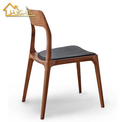 China Cheap Restaurant Dining Chair Black Faux Leather Comfortable Solid Wood Dining Chairs for sale