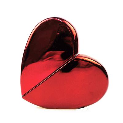 China Customized Glass Perfume Bottles Eco - Friendly , Empty High Quality Red Heart Shaped Perfume Bottle for sale