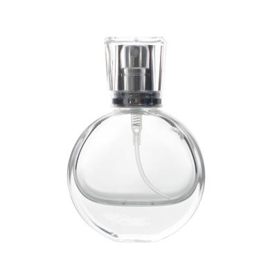 China Cosmetic Crystal Perfume Bottles 50ml Round Lid Spray Bottle Fine Mist Sprayer Glass Clear Perfume Bottle for sale