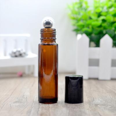 China Eco-friendly 10ml Amber Glass Roll On Bottles Essential Oil Empty Perfume Bottle for sale