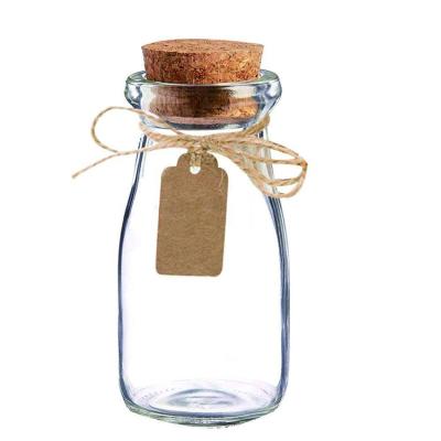 China Bottle Shaped 100ml Eco - Friendly Vintage Milk Bottle Corked Glass Bottles for sale