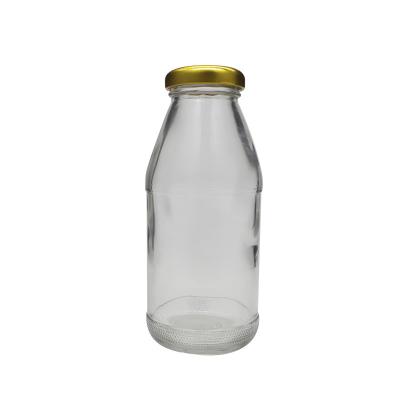 China Hot sale 200ml glass empty clear bottle eco-friendly for milk or yogurt with lid for sale