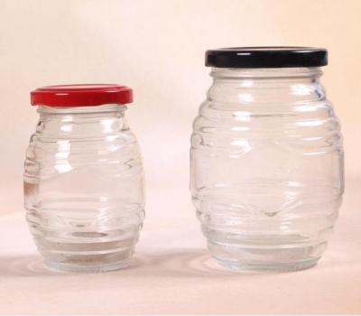 China Eco - Friendly Oval Glass Jar For Honey 250g 500g 1000g Jelly Jam Glass Jar With Twist Off Lid for sale