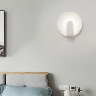 China Modern simple and creative bedroom bedroom iron art wall lamp. for sale