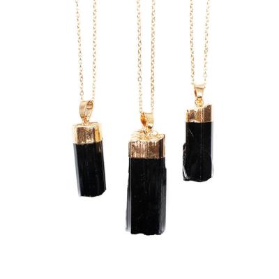 China Environmental Friendly Natural Black Stone Pendant Rough Original Tourmaline Pillar Cylindrical Energy Pendant For Woman And Man Gift Fashion Jewelry for sale