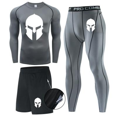 China Custom Logo Male Fitness Apparel Gym Jogging Sportswear Men Set Breathable Tights Workout for sale