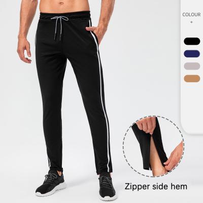 China 2022 New QUICK DRY Polyester Custom Casual Running Training Track Tights Pants Mens Joggers for sale