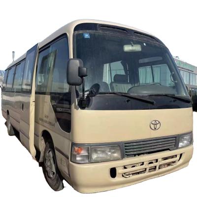 China used left hand drive toyo bellies coaster bus toyota coaster 23 seater bus for sale with gasoline engine < 4L for sale