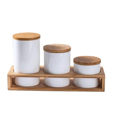 China Lanfengye Factory Wholesale Sustainable Ceramic Storage Pot White Ceramic Pot With Wood Cover for sale