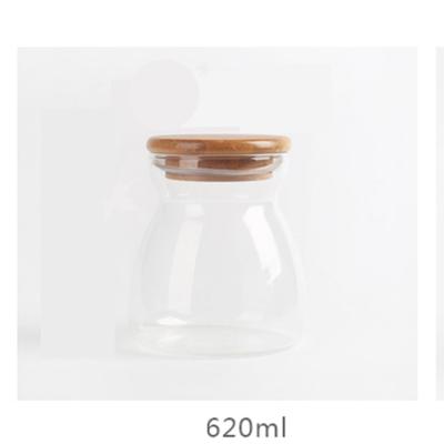 China Lanfengye Viable Airtight Candy Jar Kitchen Glass Storage Jar With Wooden Lid Creative Honey Storage Jar for sale