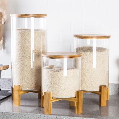 China Fresh Preservation Lanfengye Food Storage Jar Kitchen Storage Container Glass Rice Jar Set With Wooden Rack for sale