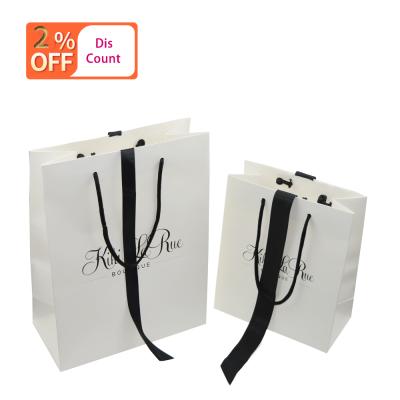 China Custom Recyclable Hot Selling Luxury White Paper Bag With Gift Ribbon for sale