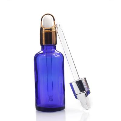 China Botellas azules de empaquetado cosméticas 50ml del dropper del cristal de botellas de aceite esencial en venta