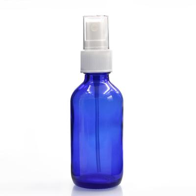 China Round ODM Boston Glass Bottles 2 Oz Blue Glass Spray Bottles for sale