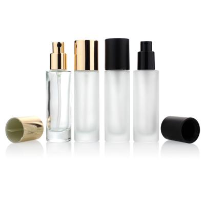 China Luxury Cosmetics Packaging 30ml Liquid Foundation Glass Bottle Packaging With Pump for sale