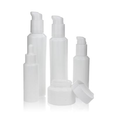 China 30ml 50ml 100ml Opal Glass Bottle Refillable Ceramic Pump Bottle for sale