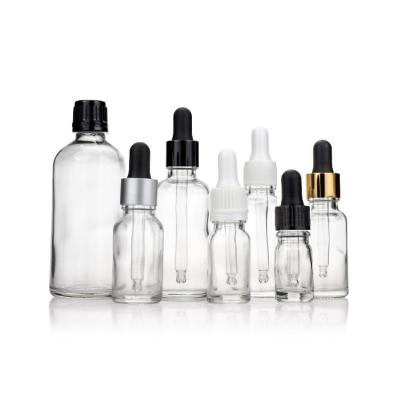 Chine Bouteille en verre d'huile de compte-gouttes noir blanc de ruban d'or transparent 5ml pour les soins personnels à vendre