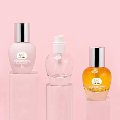 China Custom color 30ml glass foundation bottle wholesale lotion pump skin care packaging glass cosmetic foundation bottle for sale