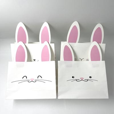 China Recycled Materials Customized Cute Cartoon Animal Bunny Rabbit Paper Easter Gift Bag For Easter Egg Packaging for sale