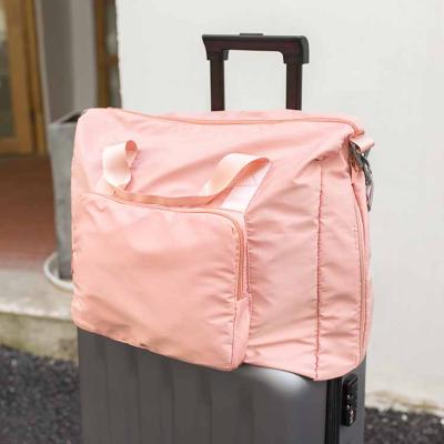 China Customized Factory Wholesale Customized Travel Factory Logo Pink Polyester Handbag Eco-friendly Durable Duffel Bag for sale