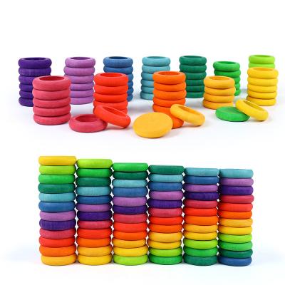 China DIY PLAY 12 Colors Kids Toys Beech Wooden Rainbow Coins And Rings Stackable Blocks Nature Loose Parts Creative Toy for sale