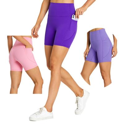 China Antibacterial Stretch Fabric Naked Gym Shorts Women Sports Yoga Running Shorts With Pockets for sale