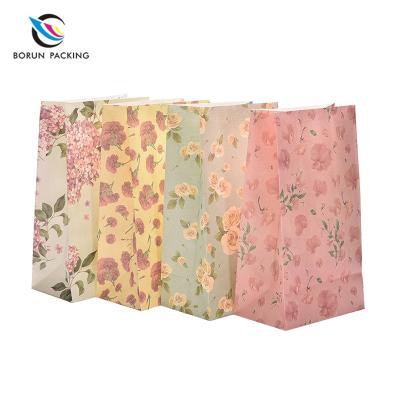 Cina Recyclable Portable flower printing paper bags gift paper bag suitable for party lolly favour wedding in vendita