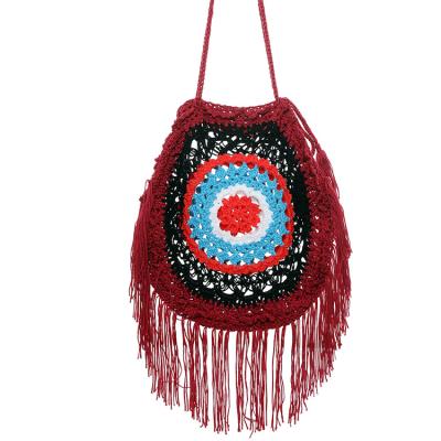 China 2022 New Style Portable Wholesale Hollow Beach Hand Hook Casual Tassel Bag for sale