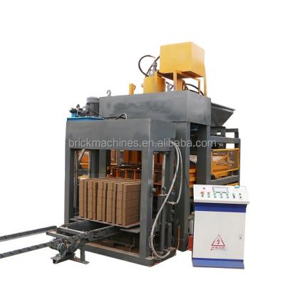 China Building Material Stores 300ton Pressure Clay Compressed Interlock Red Soil Brick Making Machine In Malaysia for sale