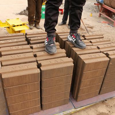 China Building Material Shops New Design Fully Automatic Hydraulic Soil Red Clay Interlocking Brick Making Machine for sale