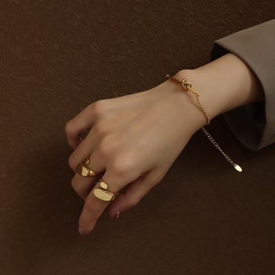 China Newest European Vintage Fashion Embrace Formed Gold Color Titanium Steel Anti-rust Open Rings for sale