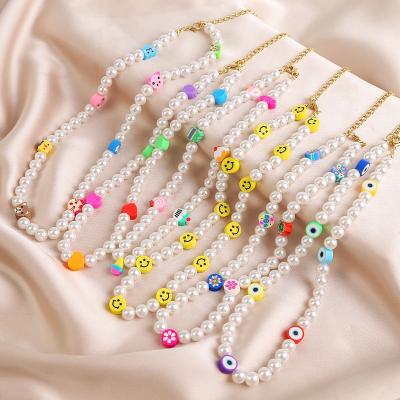 China Cute Bohemian Handmade Beaded Colorful Flowers Accessories Fashion Bead Soft Pottery Soft Pottery Smile Necklace For Female for sale