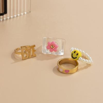 China Cute New Arrival Retro Geometric Jewelry Set Smiley Letters Adjustable Ring Sets Transparent Acrylic For Woman for sale