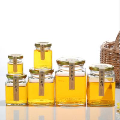 China Wholesale Food Place Round Shape Glass Bottle Honey Glass Jars With Metal Lids 50ml 100ml 200ml 300ml 380ml 480ml for sale