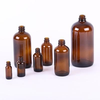 China Factory Wholesale Cosmetic Round Amber Spray Glass Bottles Boston Round Glass Bottle 1oz 2oz 4oz 8oz 16oz for sale