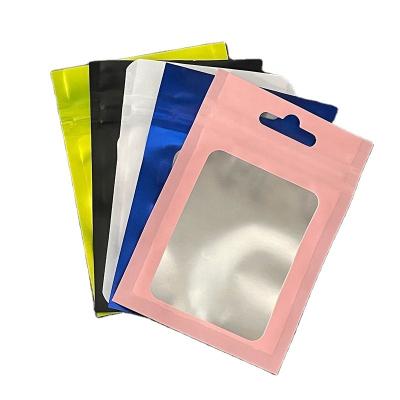 China Security In Stock And Custom Foil Plastic Packaging Mylar Zip Lock Resealable Bags With Window And Hanging Hole for sale