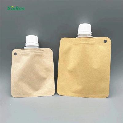 China Food Grade Custom Logo Small Packaging Sample Liquid Dispenser Kraft Cosmetic Facial Cream Pouch With Spout for sale