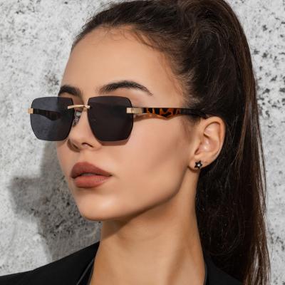 China European fashion sunglasses and American style 4 colors leopard print frame square fashion 2022 fashionable rimless sunglasses for sale