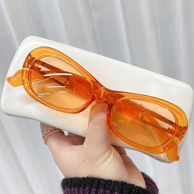 China Fashion Sunglasses Vintage Famous Brand Designer Candy Color Shades Small Oval Orange Sunglasses for sale