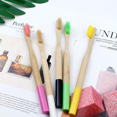 China Disposable Toothbrush With Logo Round Handle Middle Bamboo Adult Disposable Hotel Wholesale Eco Friendly Reusable for sale