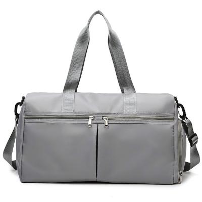 China Fashion Custom Logo Gray Travel Handbag Multi-pockets Custom Women Men Fashion Sports Gym Travel Waterproof Duffel Bag for sale