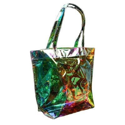 China Fashion Unique Handled Shopping Bag Women Beach Playing Laser Plastic Holographic PVC Tote Shopping Bag for sale