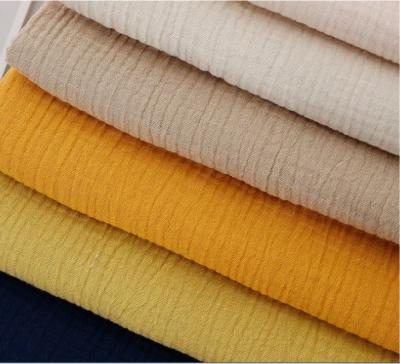 China Crinkle Finishing 100% Cotton Muslin Gauze Fabric for Baby Blanket and Pajama Solid Style for sale