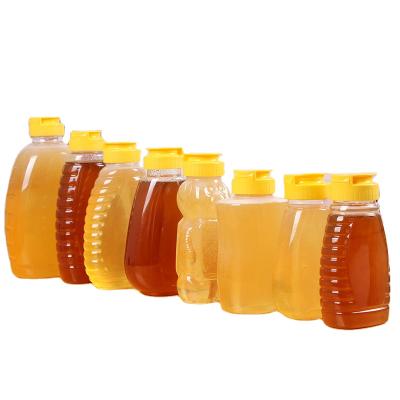 China Honey Squeeze Bottle Food Grade Sustainable Pet Shape Various Shape Factory Price Plastic Sauce Bottle With Top Flip Cap for sale