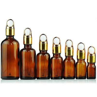 China Emerald Clear Glass Essential Oil Cosmetic Empty Green Bottles Made in China for sale