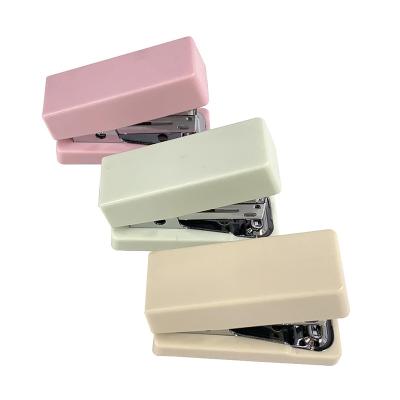 China New Style High Quality Convenient Office Metal Clamps Hand Stapler Manual Student Stationery Wholesale MiNi Desktop Paper Binding Staplers for sale