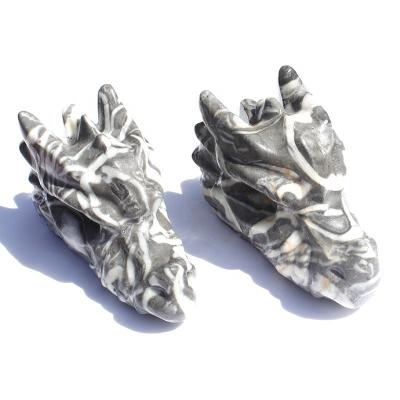 China Europe Hand Carvings Natural Shell Quartz Crystal Stone Dragon Fossil Head For Home Decor for sale